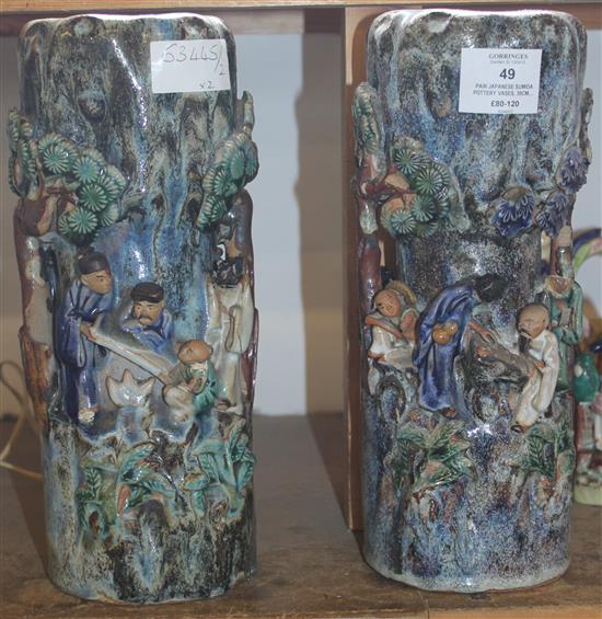 Pair Japanese Sumida pottery vases, 30cm, the sides modelled with figures (several heads damaged or missing)